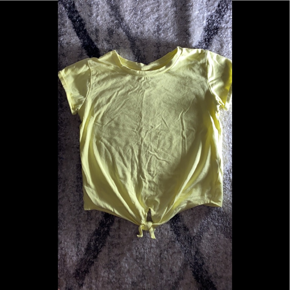 Yellow t-shirt with tie at bottom